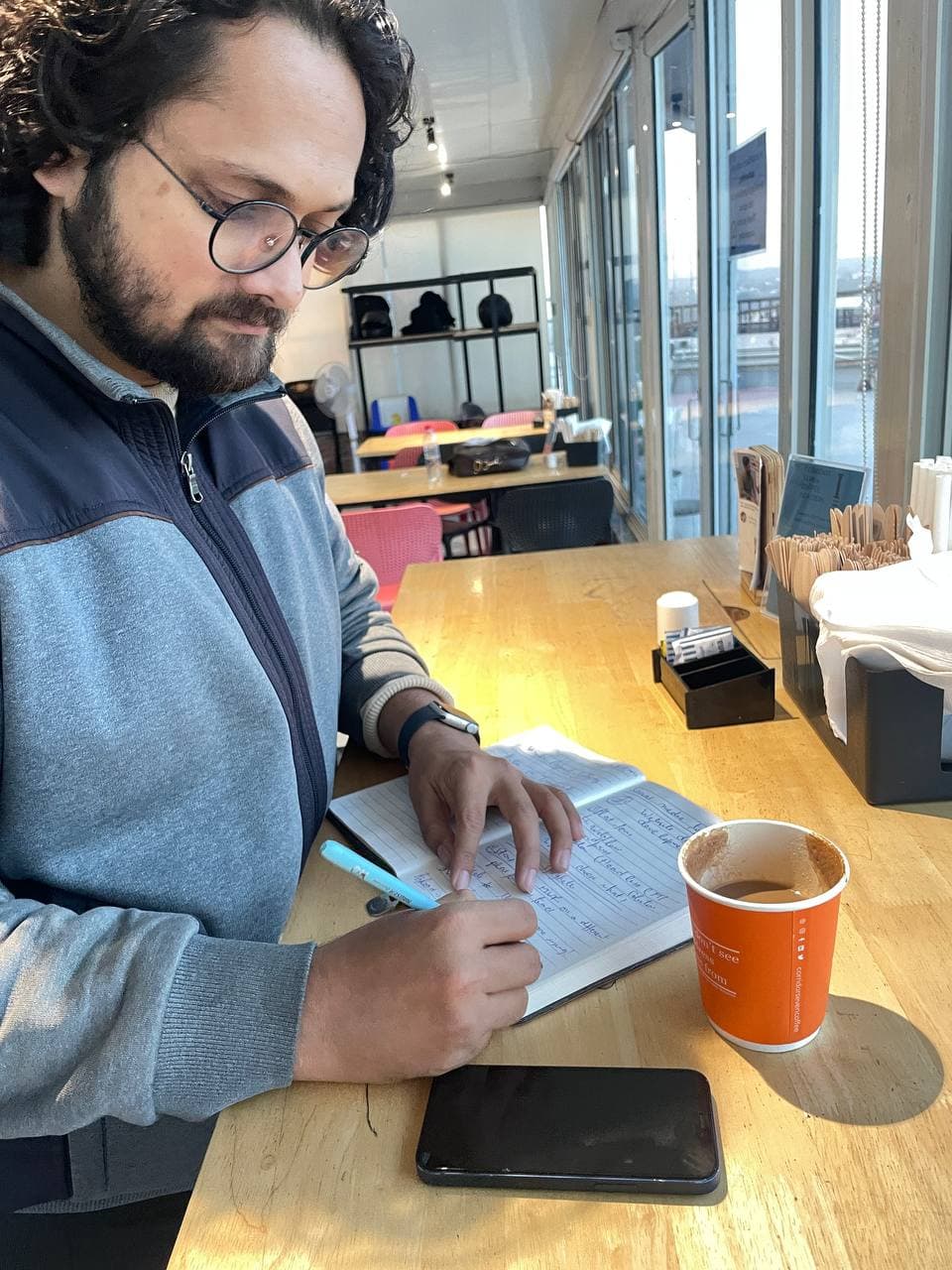Planning with pen and paper over coffee